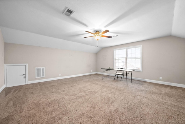 bonus room featuring ceiling fan, carpet flooring, and vaulted ceiling