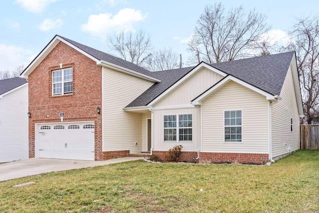 view of front facade with a garage and a front lawn