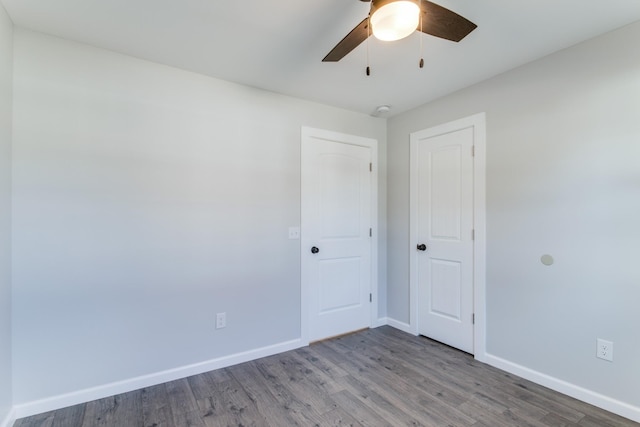 unfurnished room featuring wood-type flooring and ceiling fan