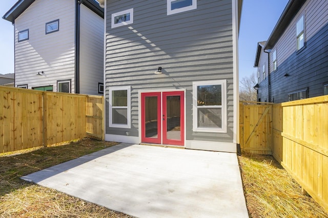 back of house with a patio area