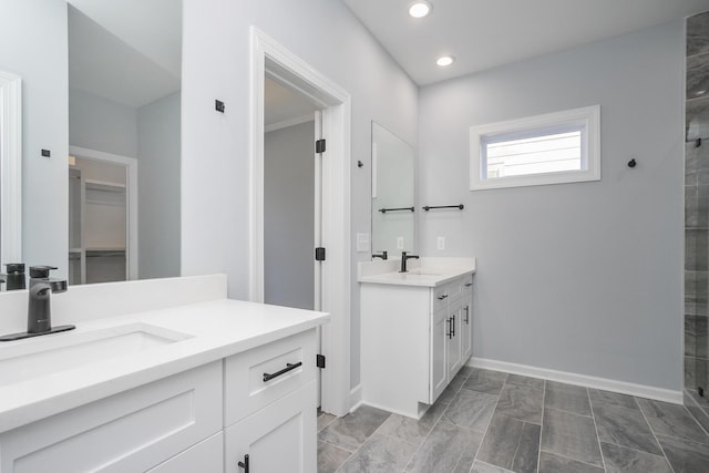 bathroom featuring vanity and a shower