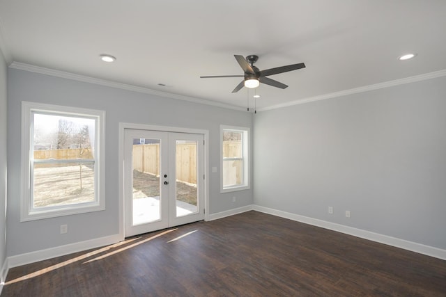 unfurnished room with crown molding, ceiling fan, dark hardwood / wood-style flooring, and french doors