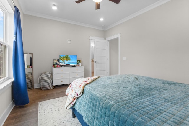 bedroom featuring multiple windows, ornamental molding, dark hardwood / wood-style floors, and ceiling fan