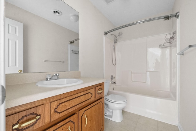 full bathroom with shower / tub combination, vanity, toilet, and tile patterned flooring