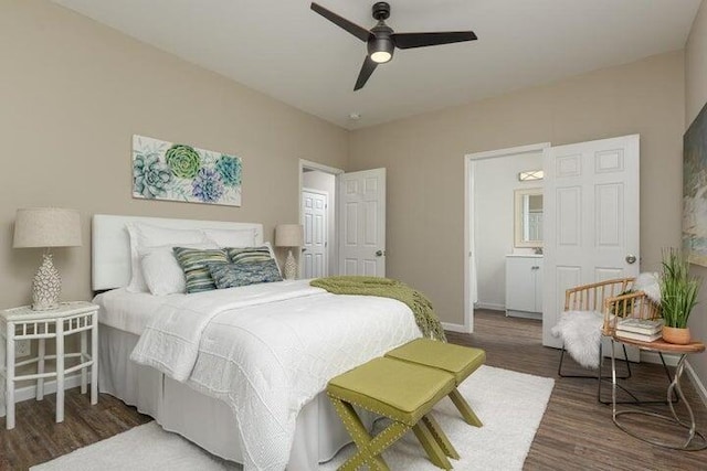 bedroom with dark hardwood / wood-style floors and ceiling fan