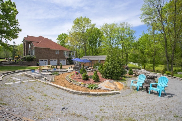 view of yard with an attached garage