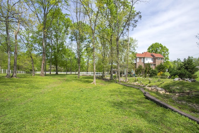 view of yard featuring fence
