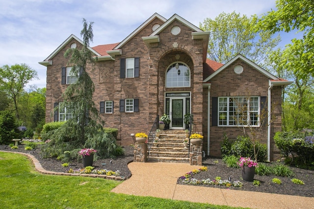 view of front of property featuring brick siding and entry steps