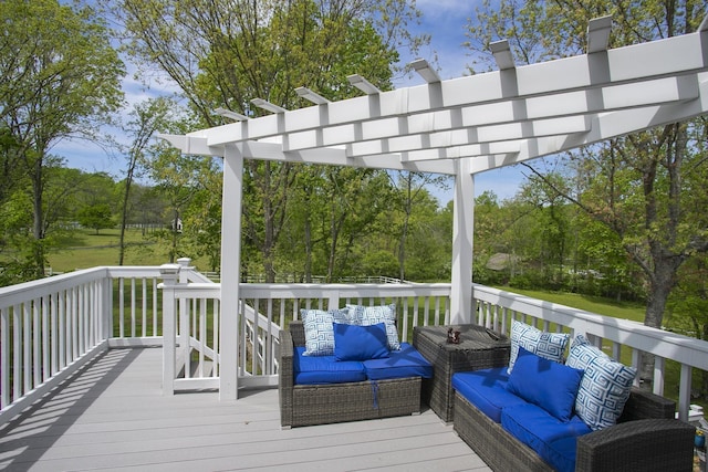 wooden terrace featuring an outdoor hangout area and a pergola