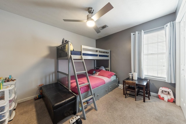 bedroom with ceiling fan and carpet