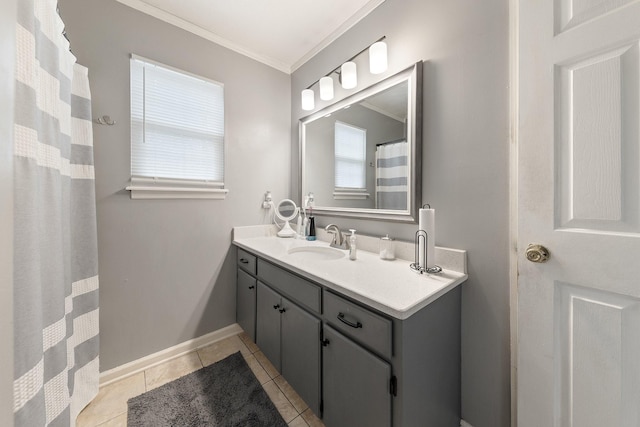 bathroom featuring tile patterned flooring, vanity, and ornamental molding