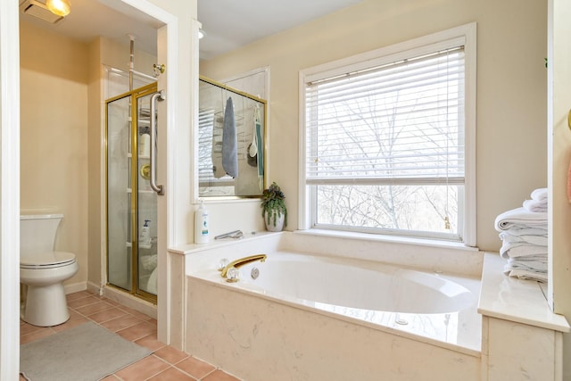 bathroom featuring tile patterned floors, toilet, and independent shower and bath