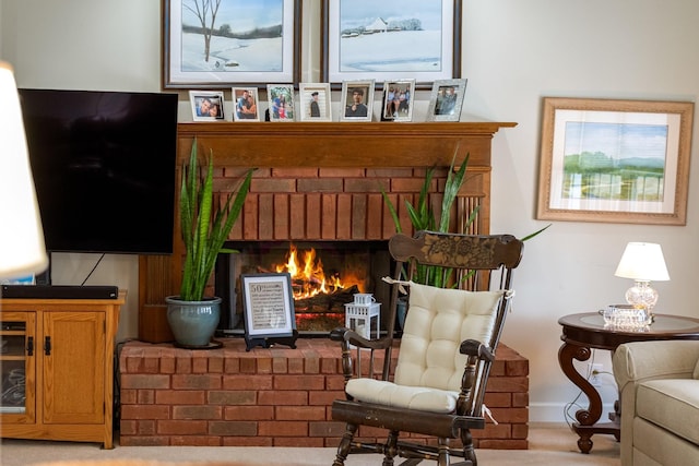 sitting room with a fireplace