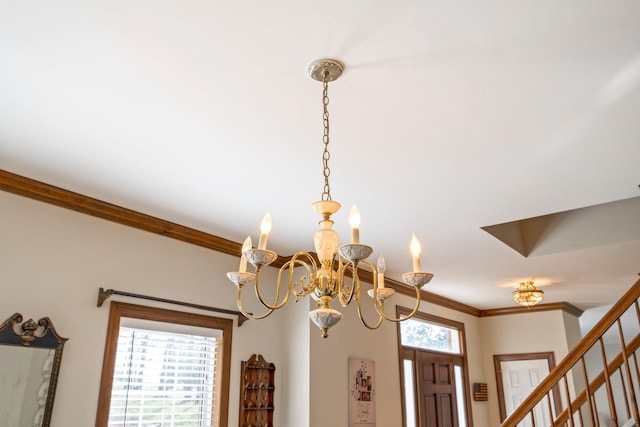 interior details with a notable chandelier and ornamental molding