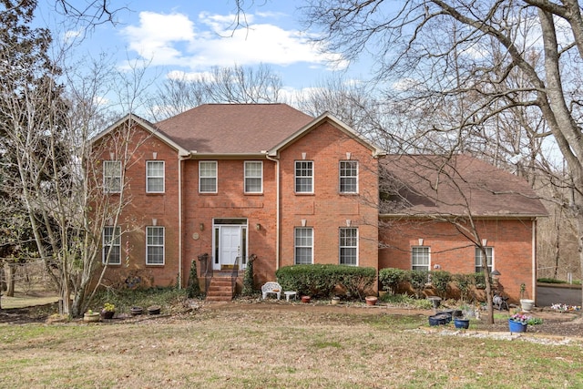 colonial house with a front lawn