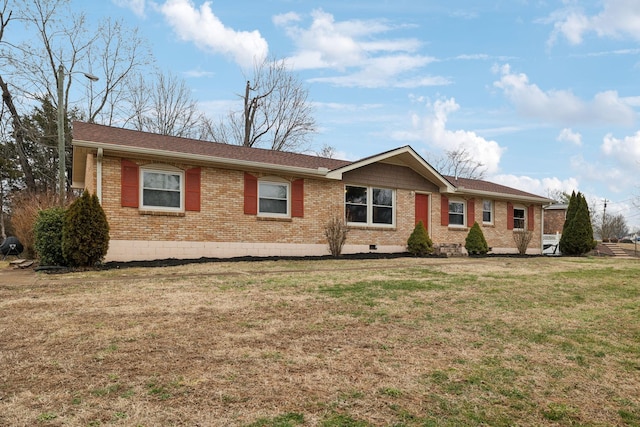 ranch-style house with a front lawn