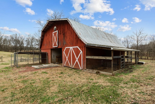 view of outdoor structure with a rural view