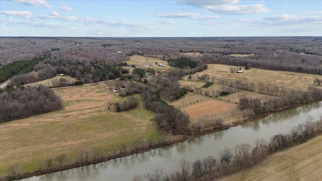 drone / aerial view with a water view and a rural view