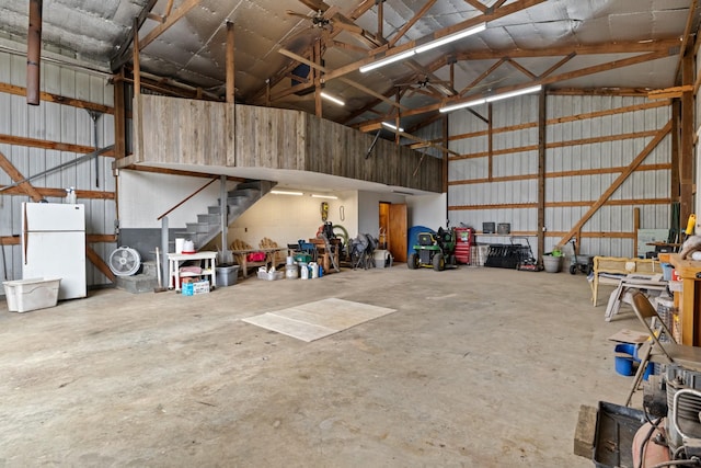 garage with white fridge