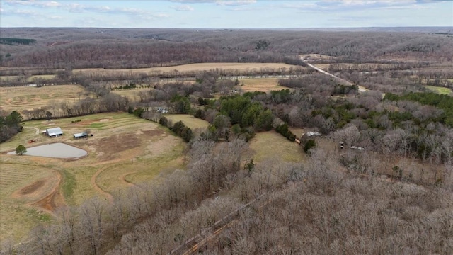 birds eye view of property featuring a rural view