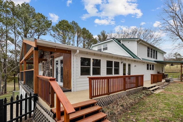 back of property featuring french doors and a deck