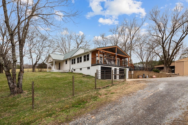 view of home's exterior featuring a yard