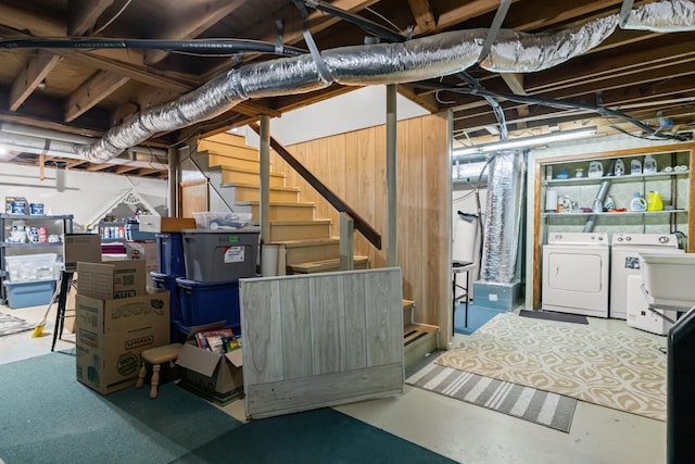 basement with washing machine and clothes dryer