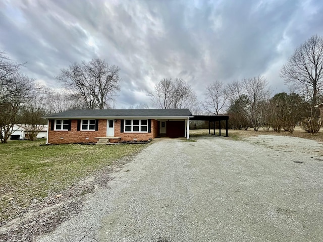 view of front of house featuring a carport