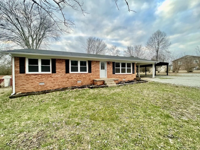 single story home with a front yard and a carport