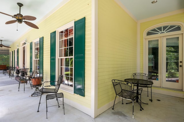 view of patio with a porch, ceiling fan, and french doors