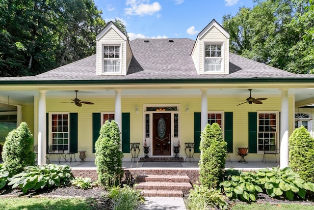 view of front of property with ceiling fan and a porch