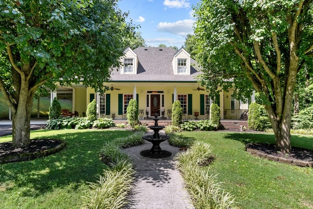 view of front of home featuring a front yard and covered porch