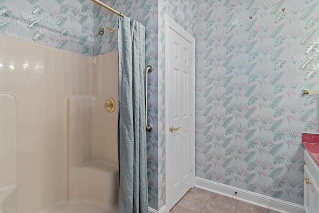 bathroom featuring tile patterned flooring and a shower with curtain
