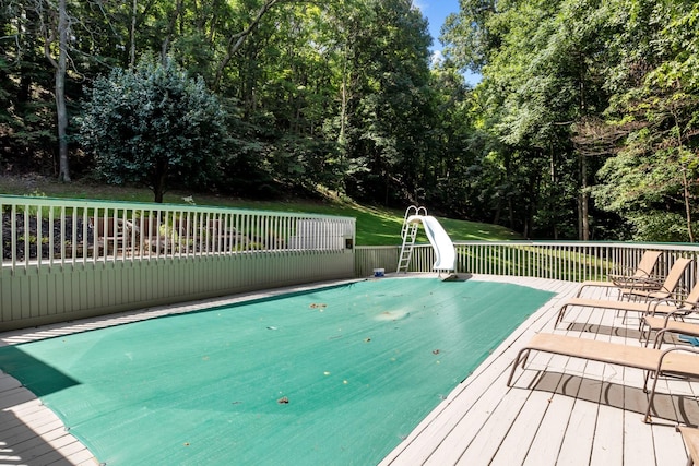 view of pool featuring a deck