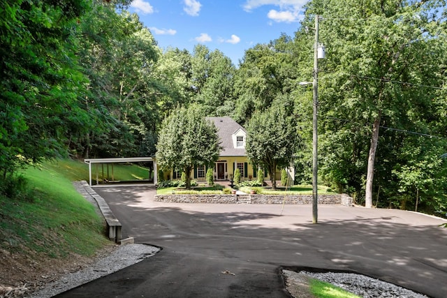 exterior space with a carport