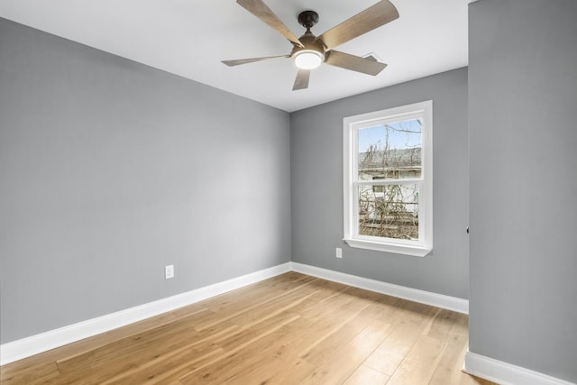 unfurnished room with ceiling fan and light hardwood / wood-style flooring