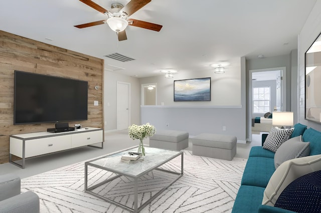 living room with ceiling fan