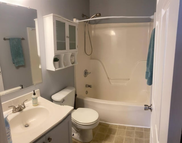 full bathroom with shower / tub combination, vanity, and toilet