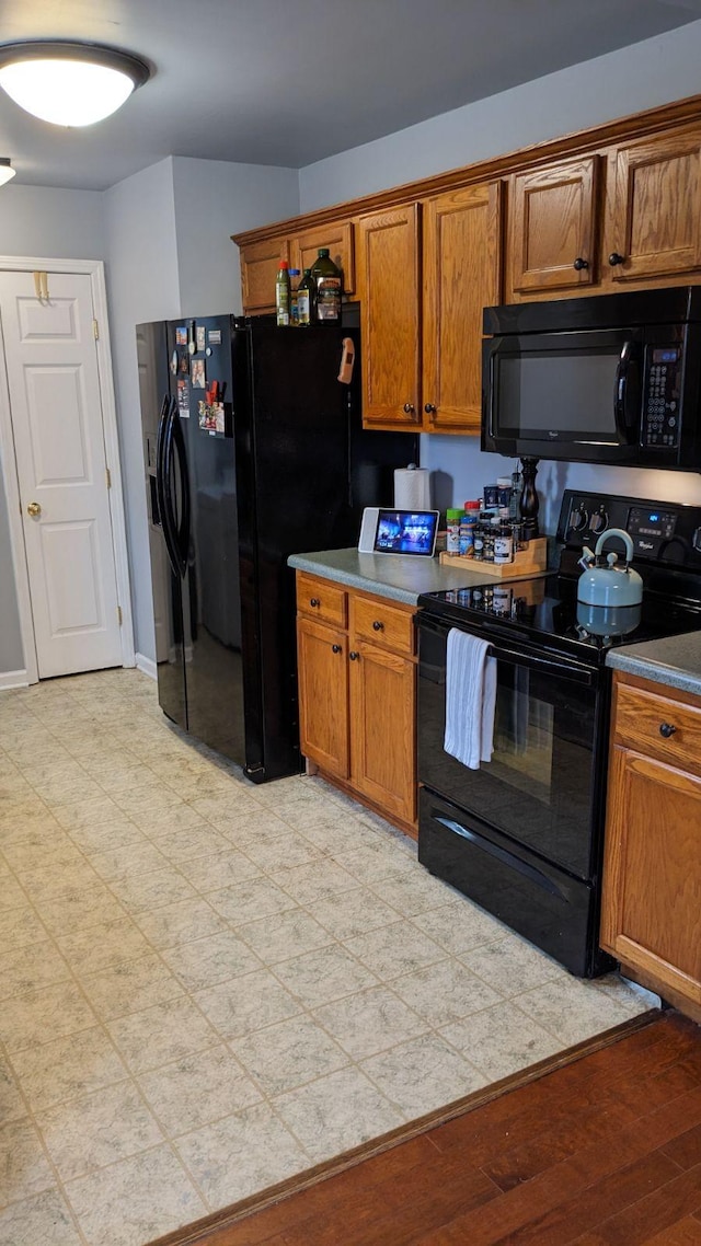 kitchen with black appliances