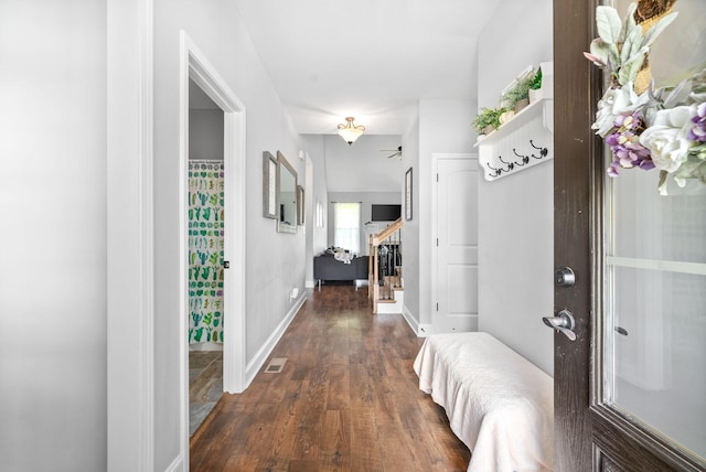 hall with dark hardwood / wood-style floors