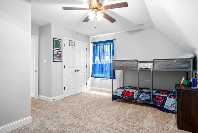 bedroom with vaulted ceiling, carpet, and ceiling fan