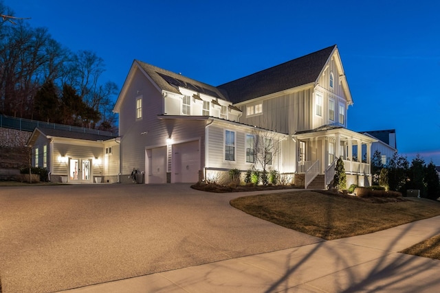 view of front of property with a garage