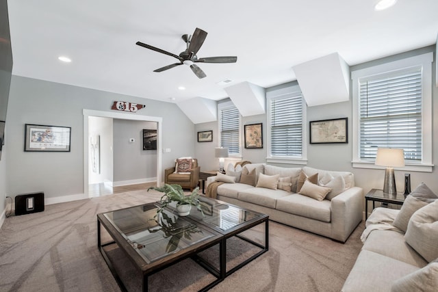 living room featuring light colored carpet and ceiling fan