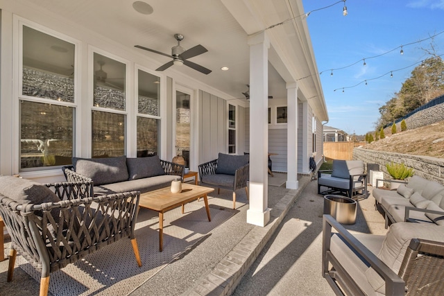 view of patio / terrace featuring an outdoor living space and ceiling fan