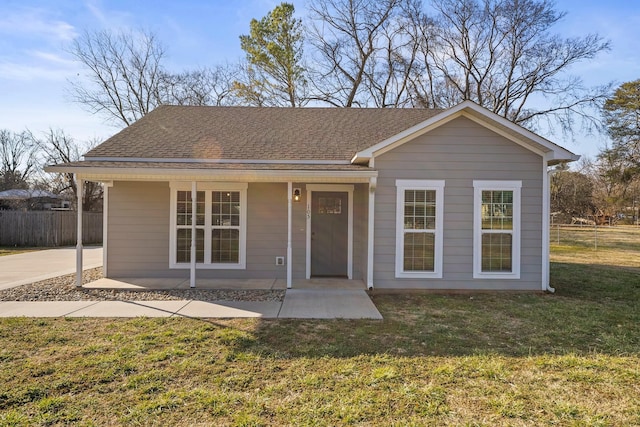 view of front of home with a porch and a front lawn