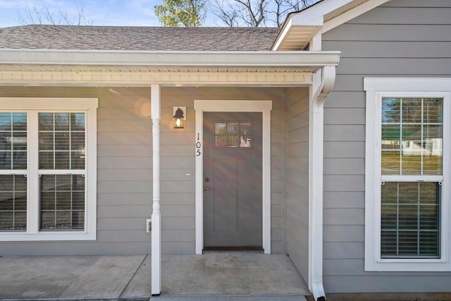 property entrance featuring covered porch