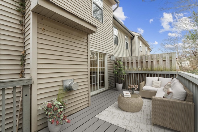 wooden deck featuring an outdoor living space