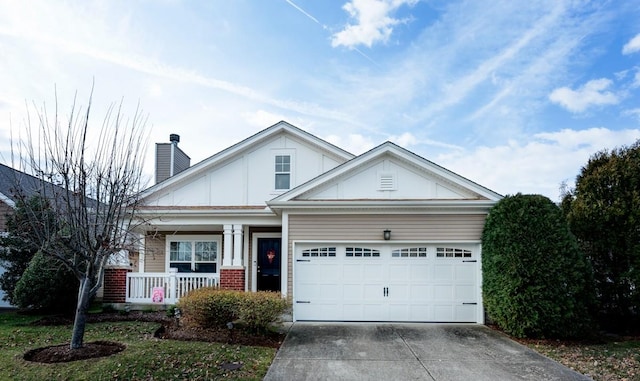 view of front of property with a garage and a porch