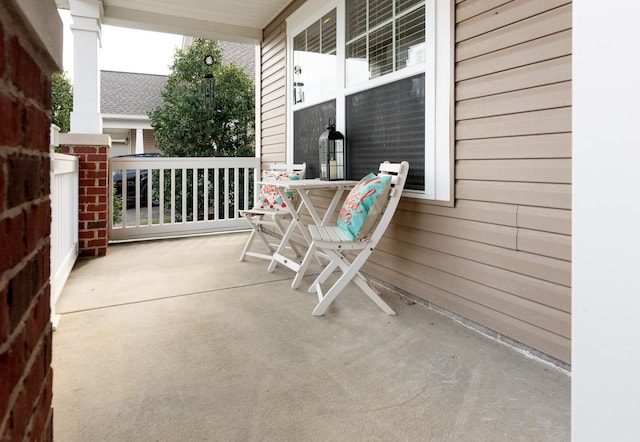 view of patio featuring a porch