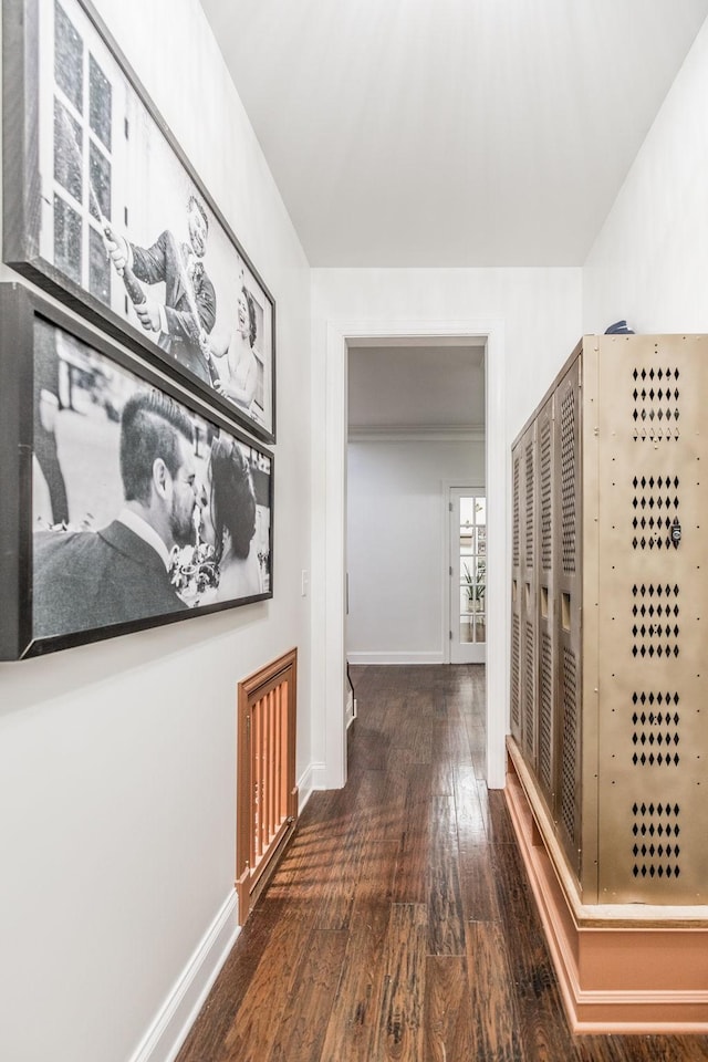 corridor featuring dark hardwood / wood-style floors